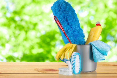 Carpet cleaner preparing equipment safely before a cleaning job